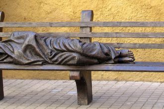 A person's living conditions don't define them in God's eyes. Those we label homeless are God's kids, of great value. He knows them by name. © Sculpture by Timothy Schmalz - Homeless Jesus