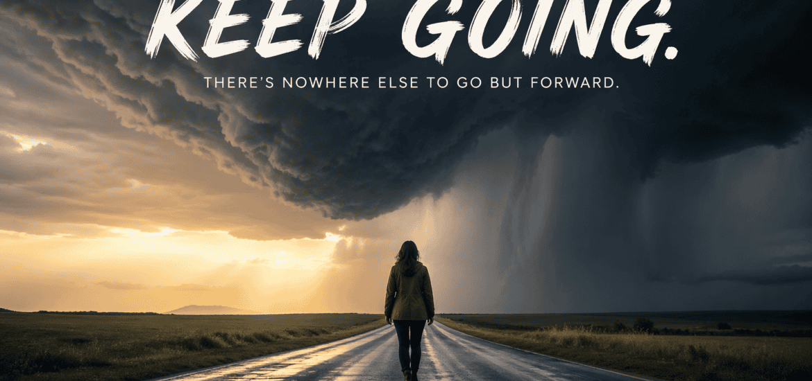 Backview of a woman walking down the centre of a highway toward an impending storm.