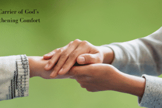 Photo of hands clasping the hands of another person, comforting.